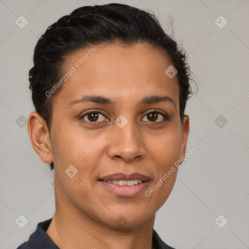 Joyful latino young-adult female with short  brown hair and brown eyes