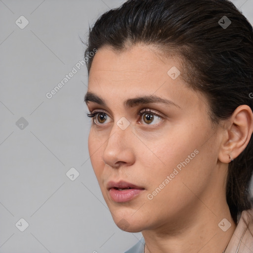 Neutral white young-adult female with long  brown hair and brown eyes