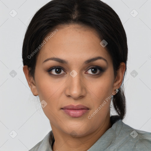 Joyful latino young-adult female with medium  brown hair and brown eyes