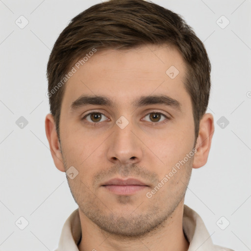 Neutral white young-adult male with short  brown hair and brown eyes