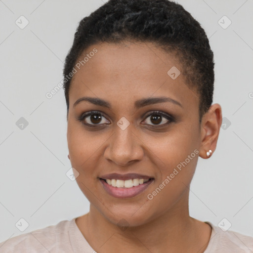 Joyful black young-adult female with short  brown hair and brown eyes