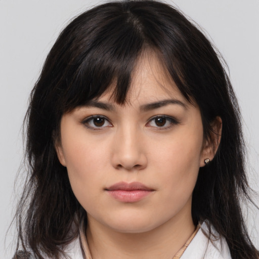 Neutral asian young-adult female with medium  brown hair and brown eyes