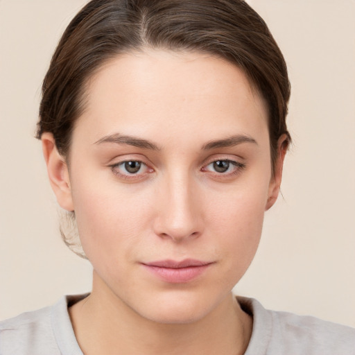 Neutral white young-adult female with medium  brown hair and brown eyes