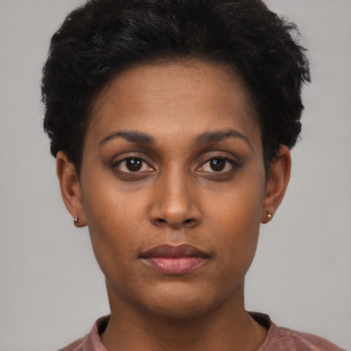 Neutral black young-adult female with short  black hair and brown eyes