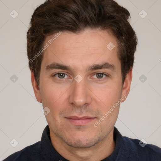 Joyful white adult male with short  brown hair and grey eyes