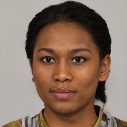 Neutral black young-adult female with short  black hair and brown eyes