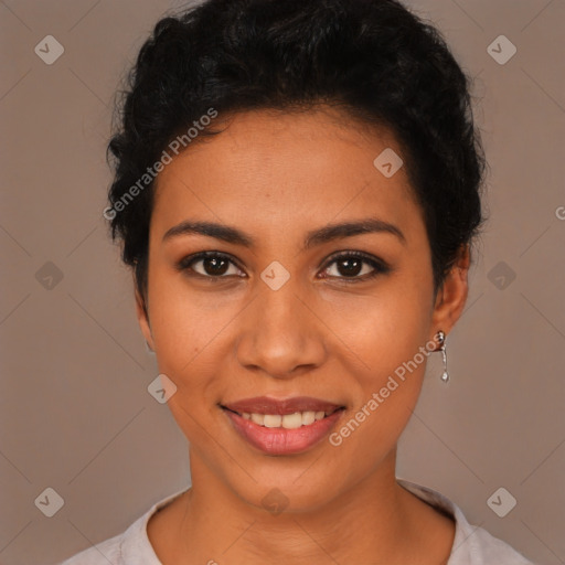 Joyful latino young-adult female with short  black hair and brown eyes