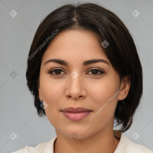 Joyful latino young-adult female with medium  brown hair and brown eyes