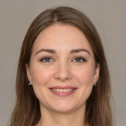 Joyful white young-adult female with long  brown hair and grey eyes