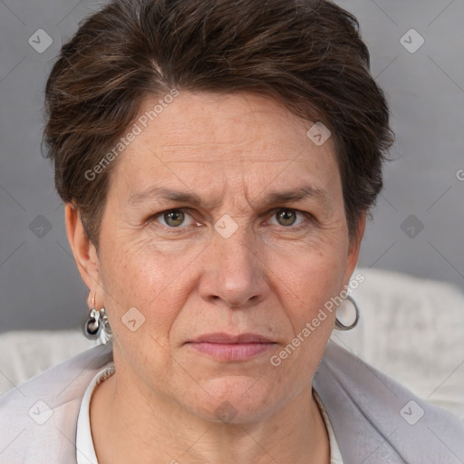 Joyful white adult female with short  brown hair and brown eyes