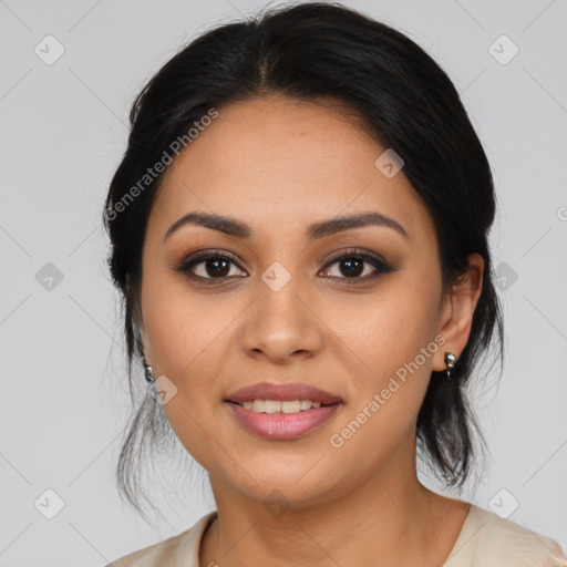 Joyful latino young-adult female with medium  black hair and brown eyes