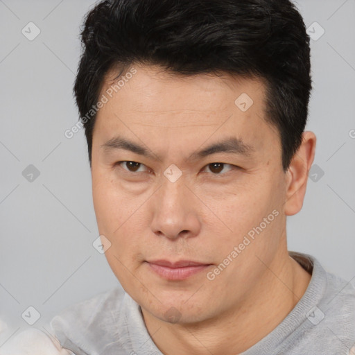 Neutral asian young-adult male with short  brown hair and brown eyes