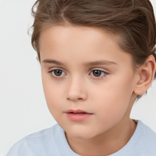 Neutral white child female with short  brown hair and brown eyes