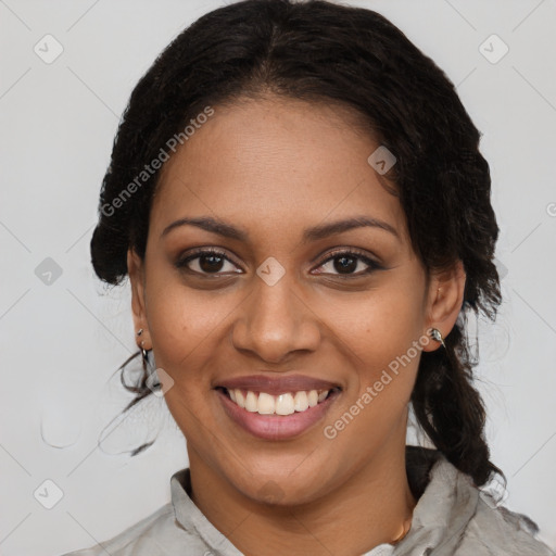 Joyful black young-adult female with medium  brown hair and brown eyes