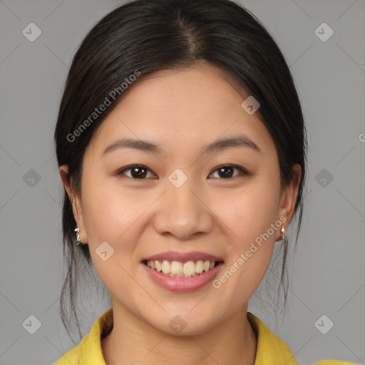 Joyful white young-adult female with medium  brown hair and brown eyes