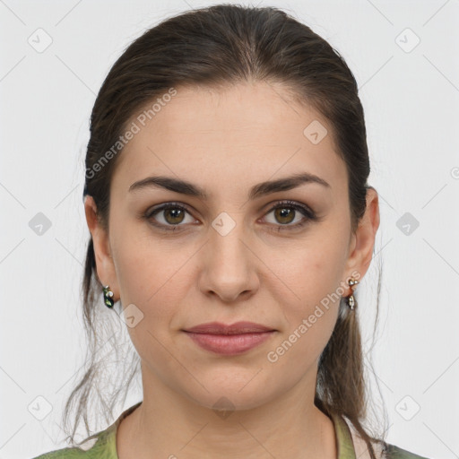 Joyful white young-adult female with long  brown hair and grey eyes