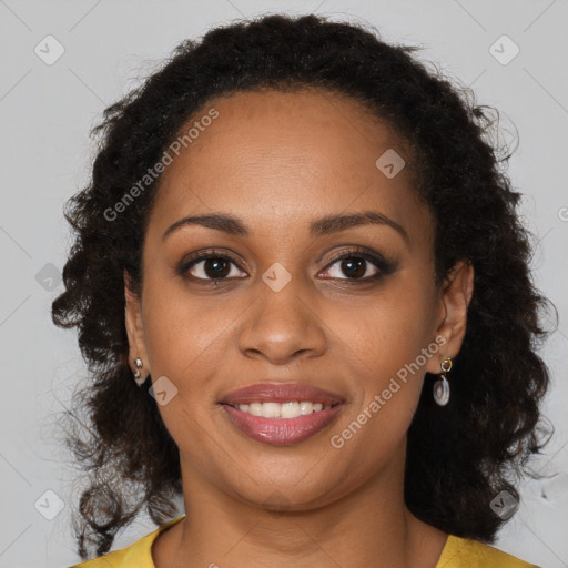 Joyful black young-adult female with long  brown hair and brown eyes