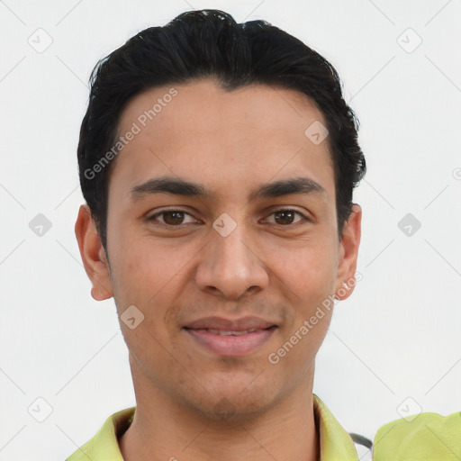 Joyful latino young-adult male with short  black hair and brown eyes