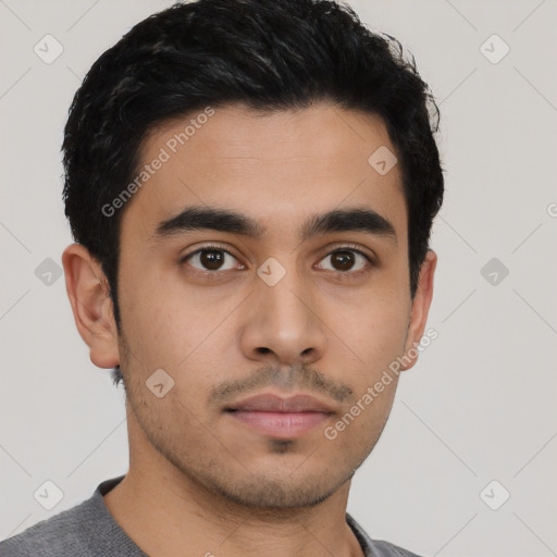 Neutral latino young-adult male with short  black hair and brown eyes