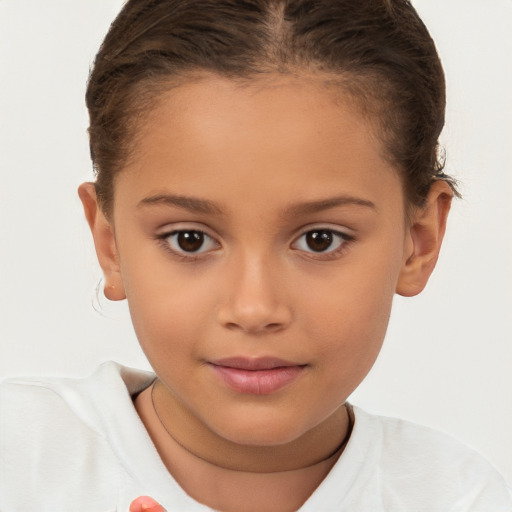 Joyful white child female with short  brown hair and brown eyes