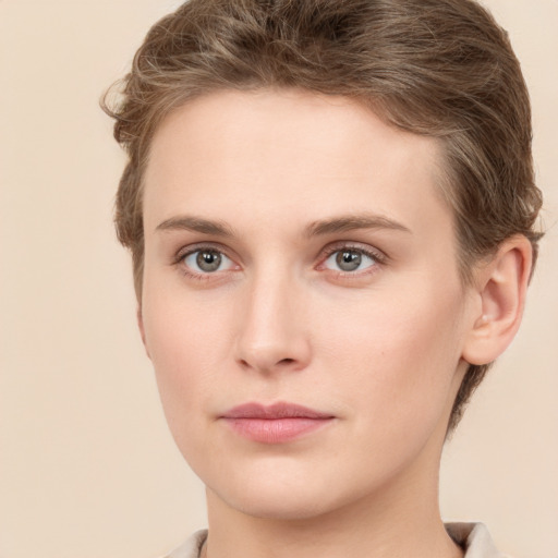 Neutral white young-adult female with short  brown hair and green eyes