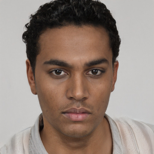 Neutral white young-adult male with short  black hair and brown eyes