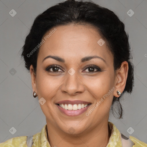 Joyful latino adult female with medium  brown hair and brown eyes