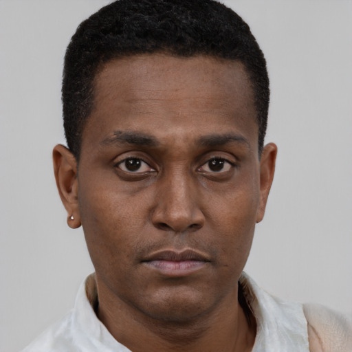 Neutral black young-adult male with short  black hair and brown eyes