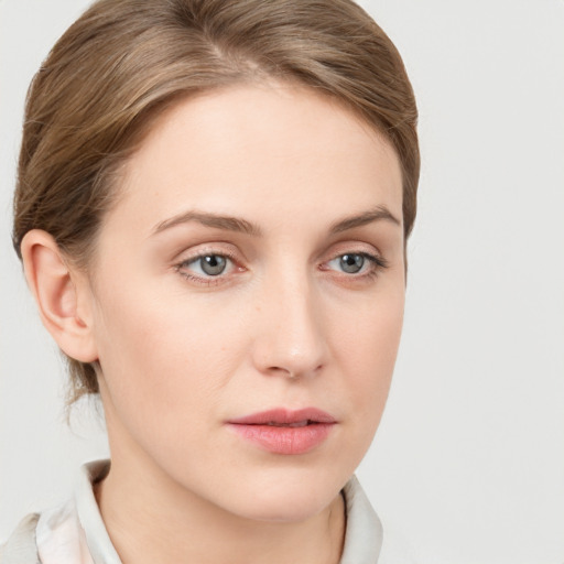 Neutral white young-adult female with medium  brown hair and grey eyes