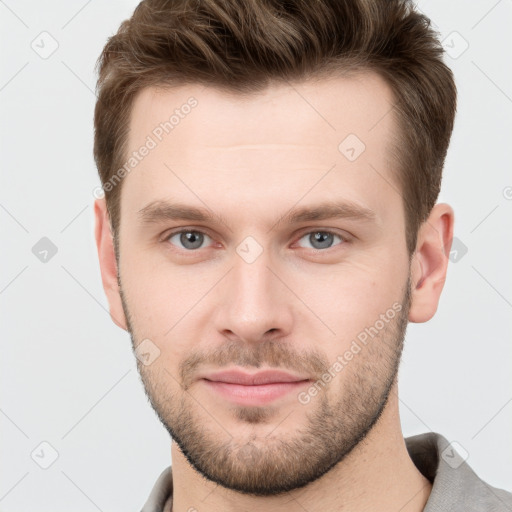 Neutral white young-adult male with short  brown hair and grey eyes