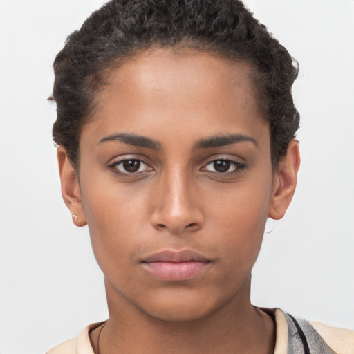 Neutral white young-adult female with short  brown hair and brown eyes