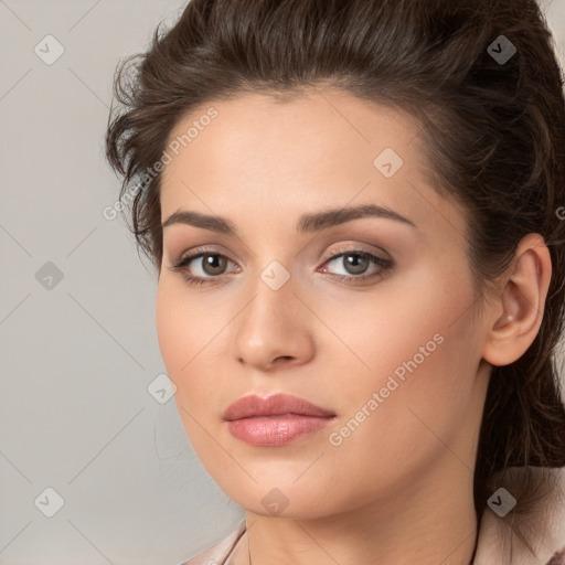 Neutral white young-adult female with long  brown hair and brown eyes