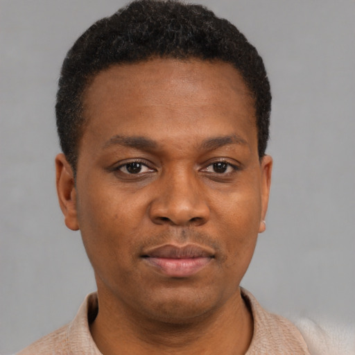 Neutral black young-adult male with short  brown hair and brown eyes