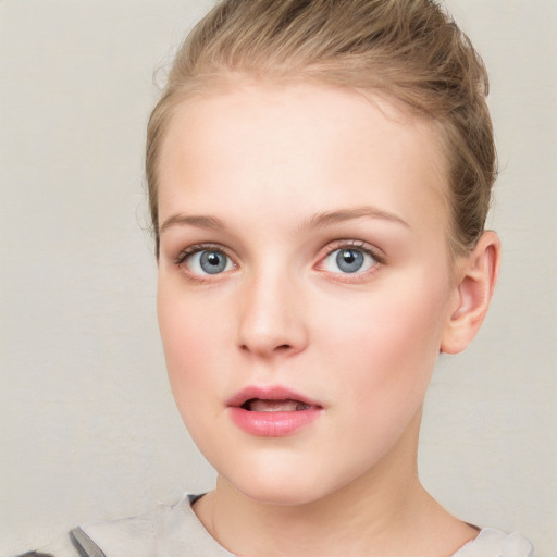 Neutral white young-adult female with short  brown hair and blue eyes