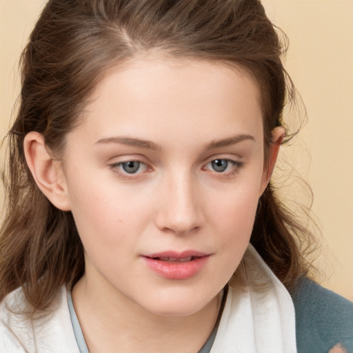 Joyful white child female with medium  brown hair and brown eyes