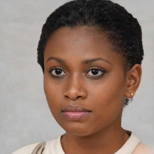 Neutral latino young-adult female with short  brown hair and brown eyes