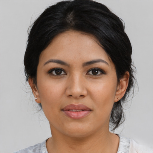 Joyful asian young-adult female with medium  black hair and brown eyes