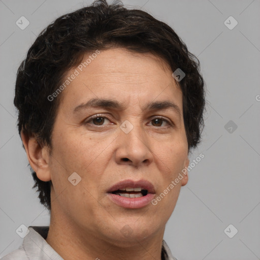 Joyful white adult female with short  brown hair and brown eyes