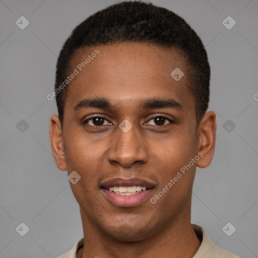 Joyful black young-adult male with short  brown hair and brown eyes