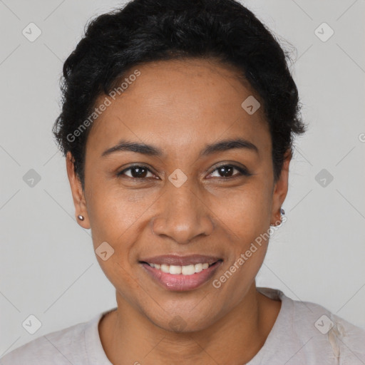 Joyful latino young-adult female with short  black hair and brown eyes