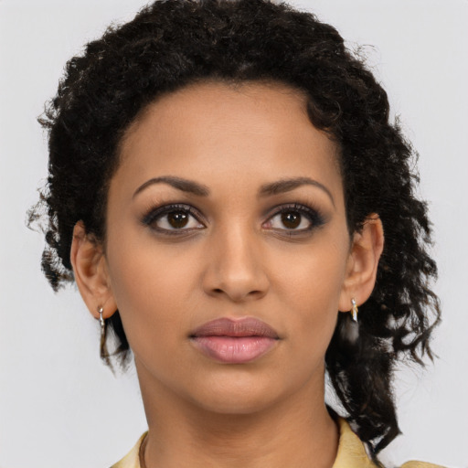 Neutral latino young-adult female with medium  brown hair and brown eyes