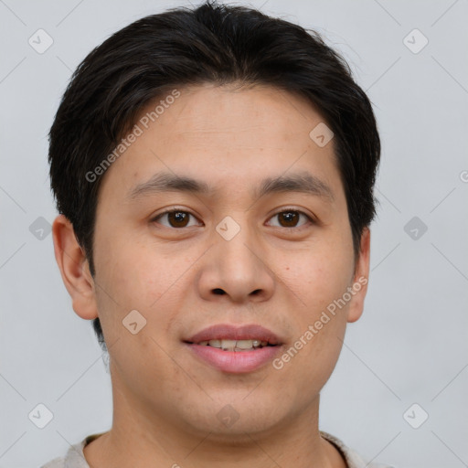 Joyful asian young-adult male with short  brown hair and brown eyes