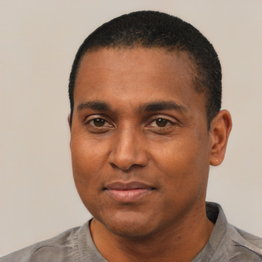 Neutral black young-adult male with short  black hair and brown eyes