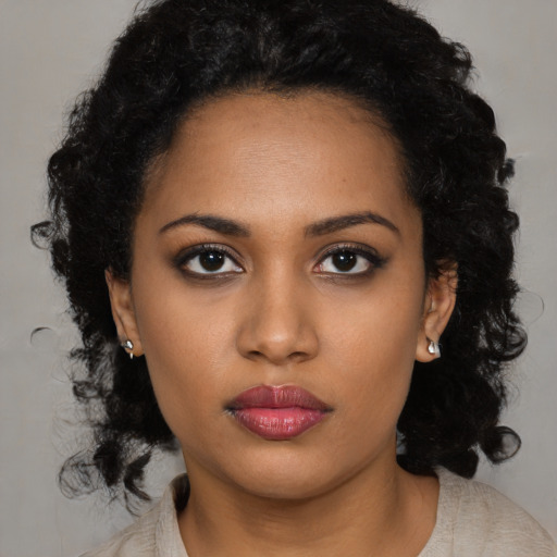 Neutral black young-adult female with long  black hair and brown eyes