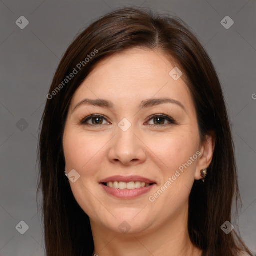 Joyful white young-adult female with long  brown hair and brown eyes