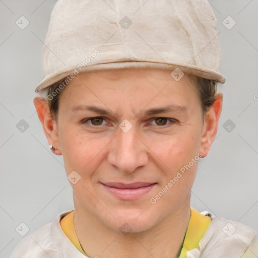 Joyful white young-adult female with short  brown hair and grey eyes