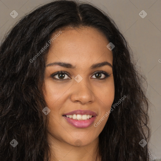 Joyful latino young-adult female with long  brown hair and brown eyes