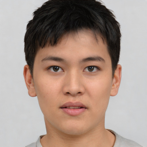 Neutral asian young-adult male with short  brown hair and brown eyes