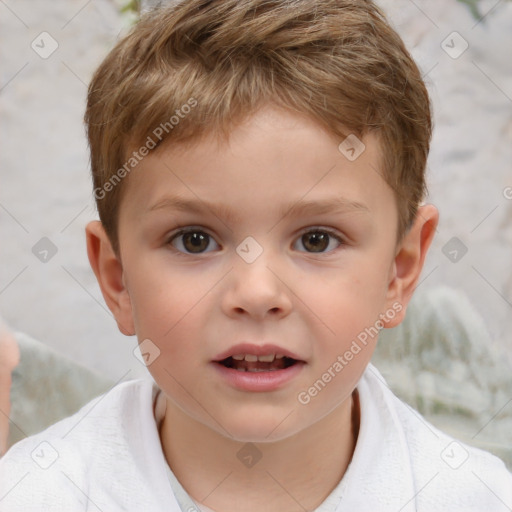 Joyful white child male with short  brown hair and brown eyes