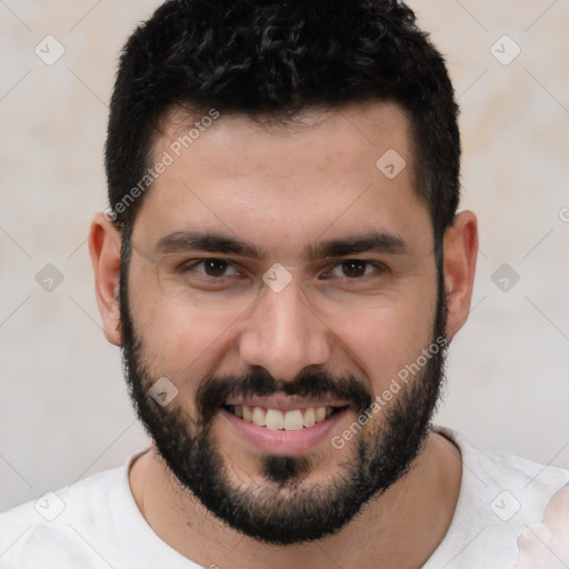 Joyful white young-adult male with short  black hair and brown eyes